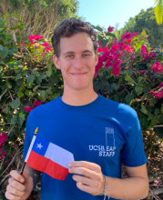 Photo of Nathan holding a Chile flag